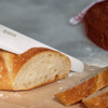 Picture of INNOVATIONwhite™   7" Ceramic Bread Knife - White Z212 Micro Serrated Blade with Non-Slip Black Handle